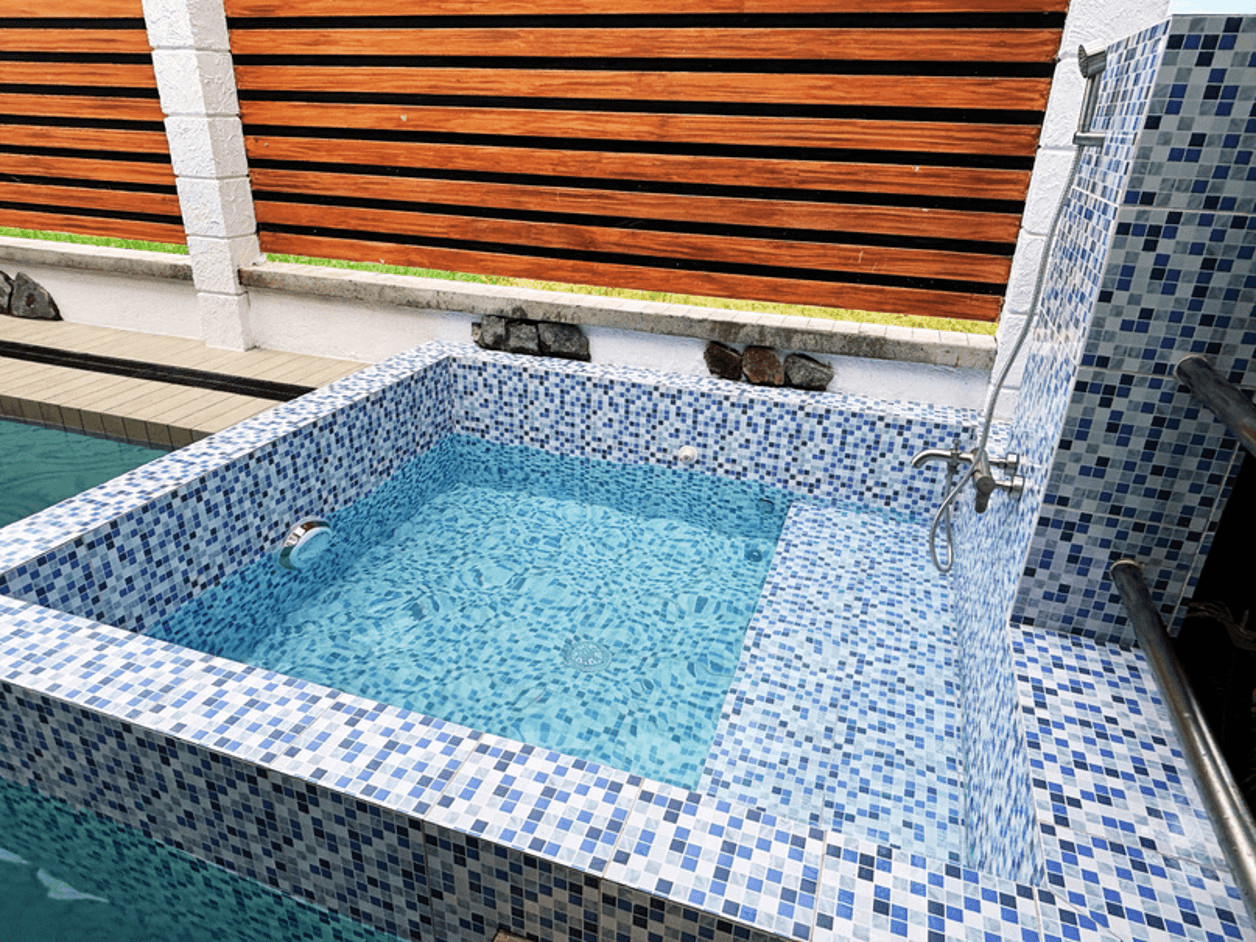 Heated mini pool with blue mosaic tiles at La Tehillah Private Resort